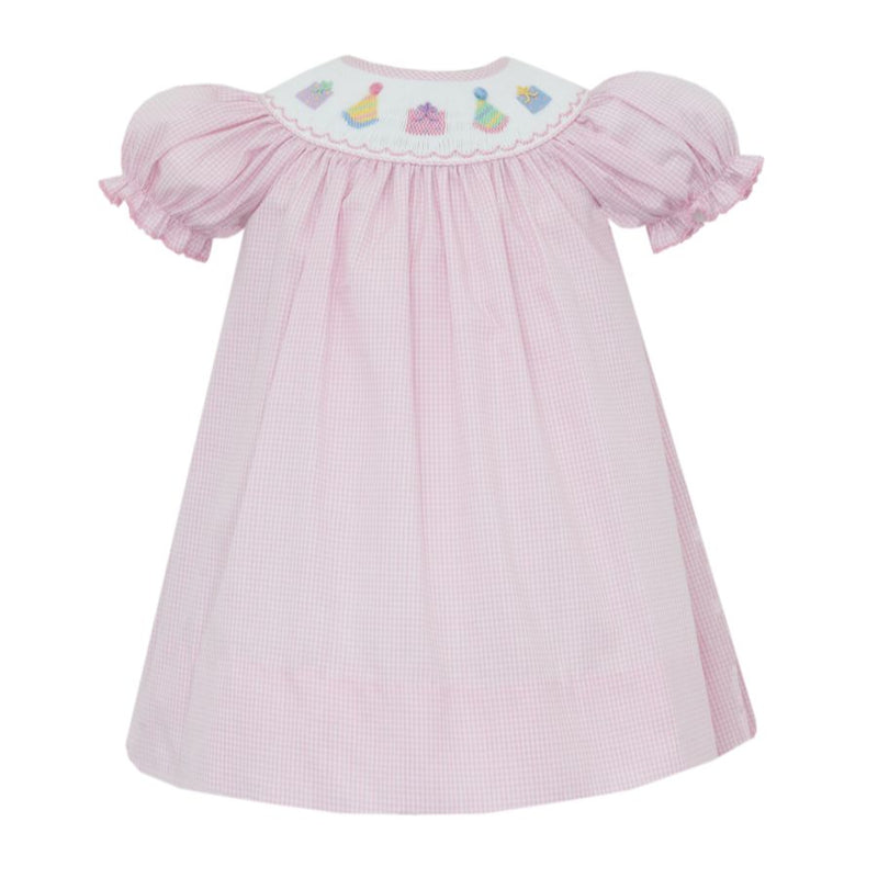 Pink dress with embroidered collar on a white background