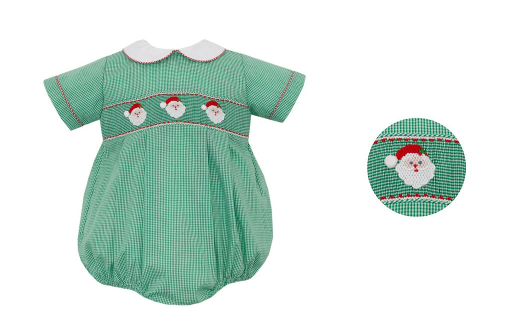Green gingham smocked baby romper with Santa face design on a white background