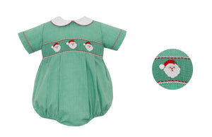 Green gingham smocked baby romper with Santa face design on a white background