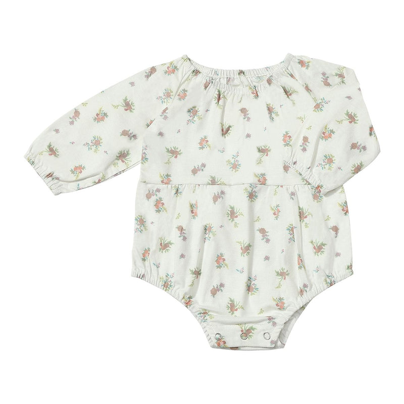 Floral-patterned baby romper on a white background