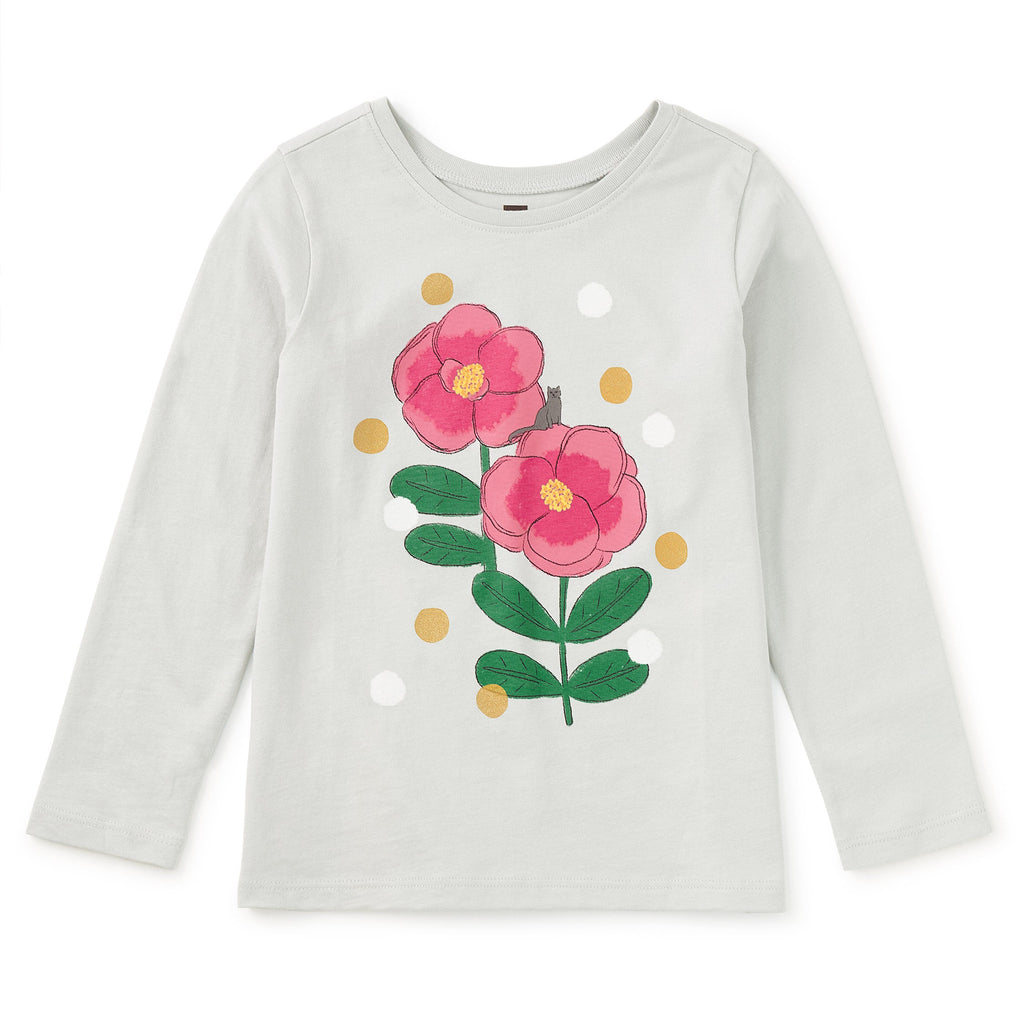 White long-sleeve shirt with pink floral design on a white background