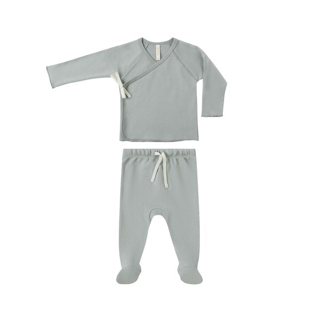 Steel blue baby outfit with long-sleeve top and pants on a white background
