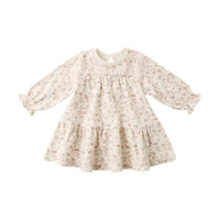 Floral dress with long sleeves on a white background