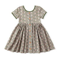 Floral dress with buttons on a white background