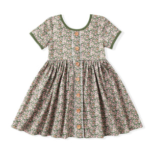 Floral dress with buttons on a white background