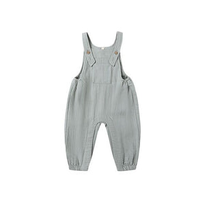steel blue baby overalls on a white background
