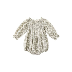 Floral-patterned baby romper on a white background