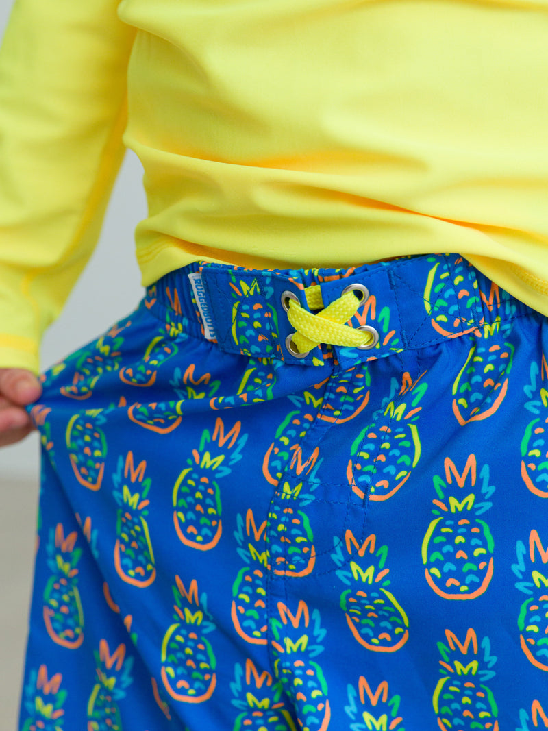 Neon Blue Pineapples - Swim Trunks