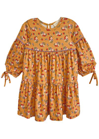 Yellow dress with floral pattern on a white background