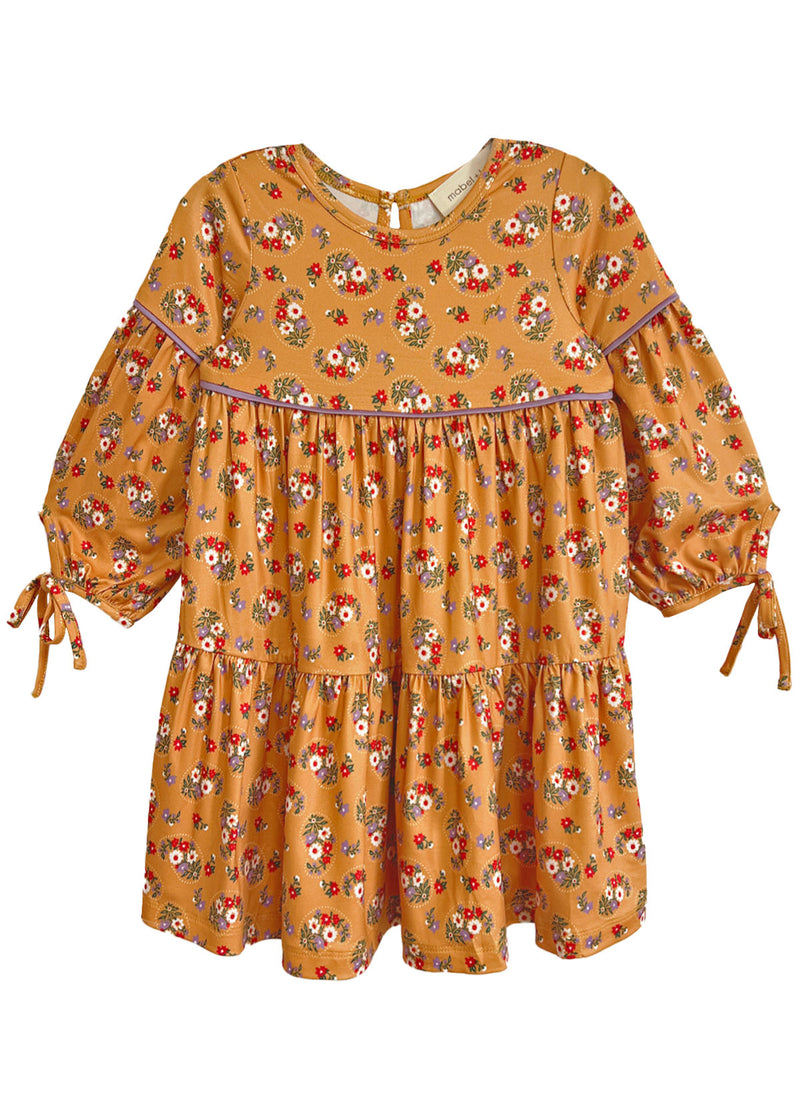 Yellow dress with floral pattern on a white background