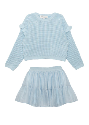 Light blue sweater top and tutu skirt set on a white background