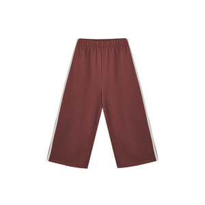 Maroon pants with white stripes on a white background