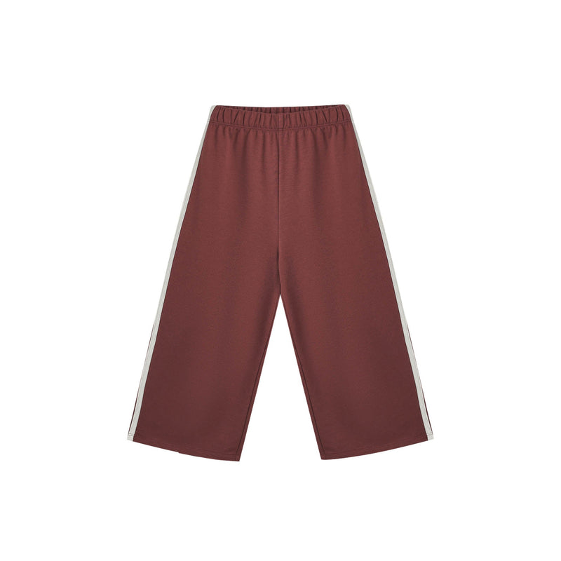 Maroon pants with white stripes on a white background