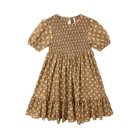 Golden floral dress on a white background