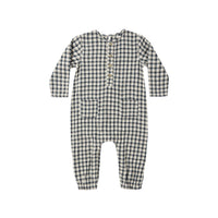 Navy and white checkered baby coverall on a white background