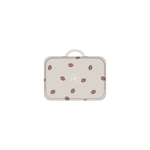 Small suitcase with football pattern on a white background