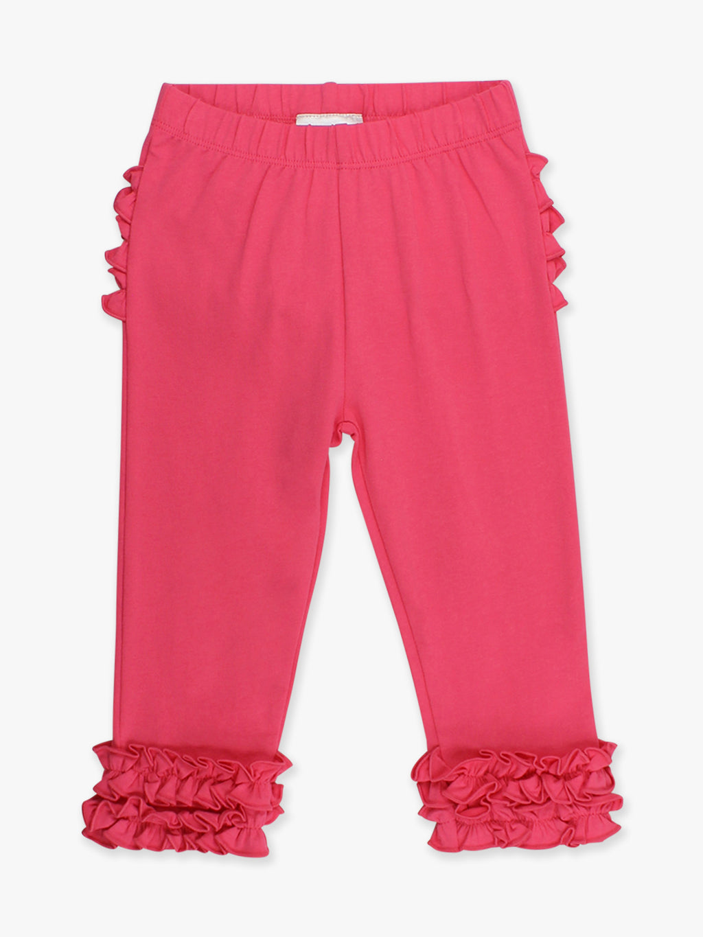 Pink pants with ruffled details on a white background