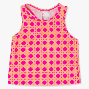 Pink and yellow patterned tank top on a white background