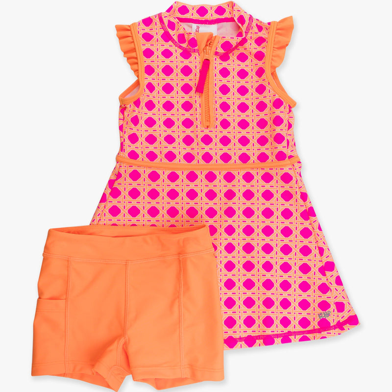 Pink and orange dress with matching shorts on a white background