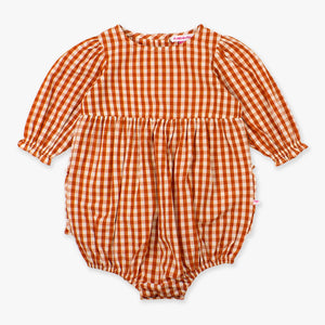 Orange and white gingham baby romper on a white background