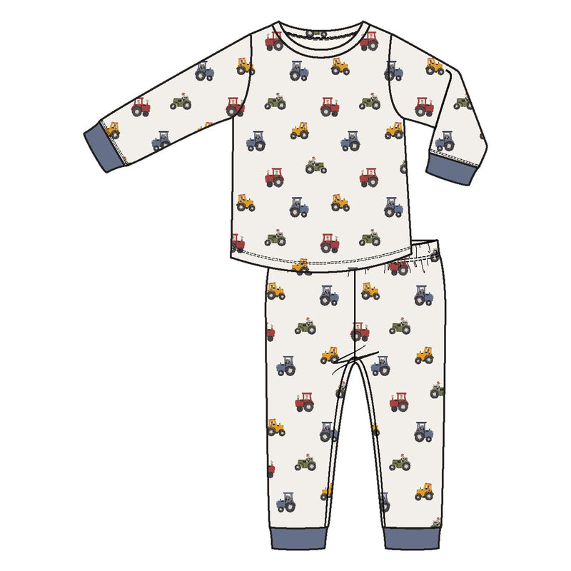 Children's pajama set with tractor pattern on a white background