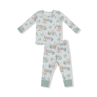 Children's pajama set with forest deer pattern on a white background