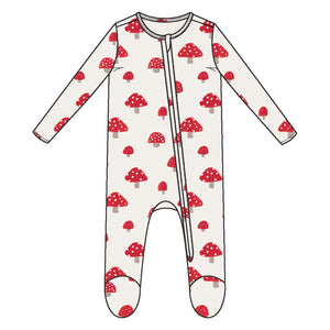White baby onesie with red mushroom pattern on a white background