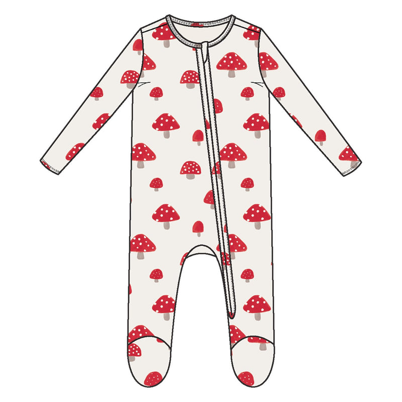 White baby onesie with red mushroom pattern on a white background